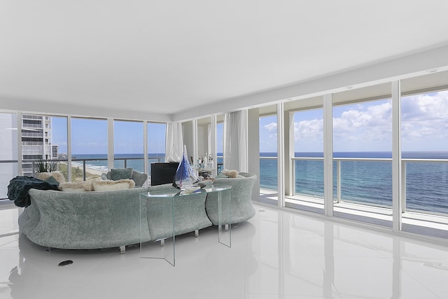 2800 S Ocean Blvd Unit 14A, Boca Raton, FL 33432 - living area with tile patterned flooring and a water view