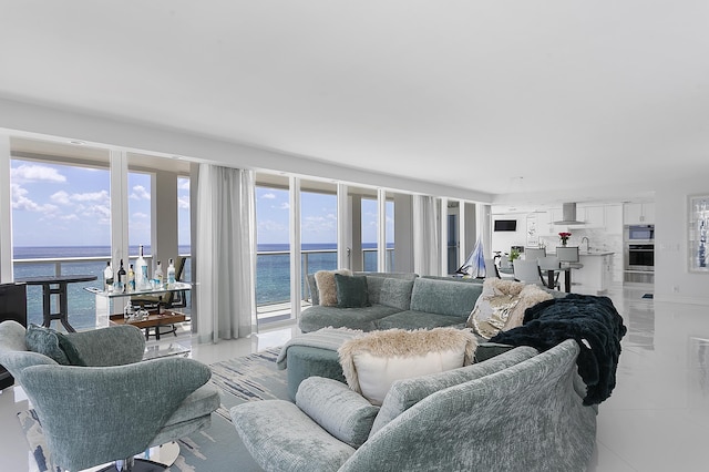 2800 S Ocean Blvd Unit 14A, Boca Raton, FL 33432 - living room featuring light tile patterned floors and a water view
