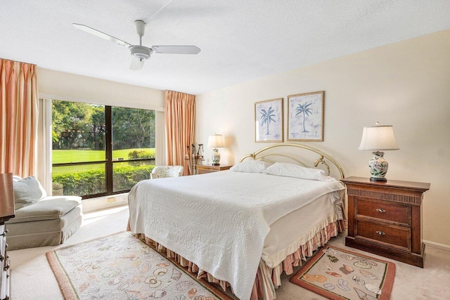 bedroom with carpet floors and a ceiling fan