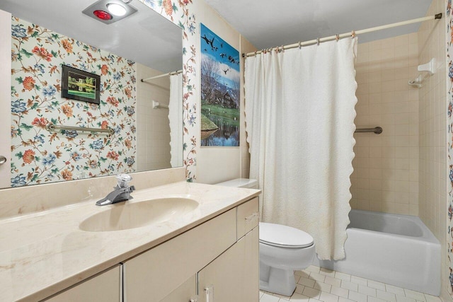 bathroom with tile patterned flooring, toilet, vanity, wallpapered walls, and shower / bath combo