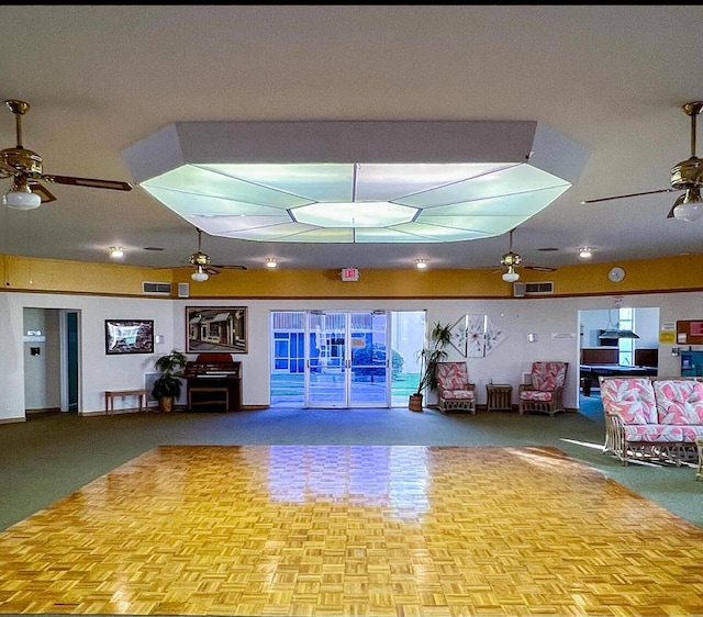 building lobby featuring visible vents
