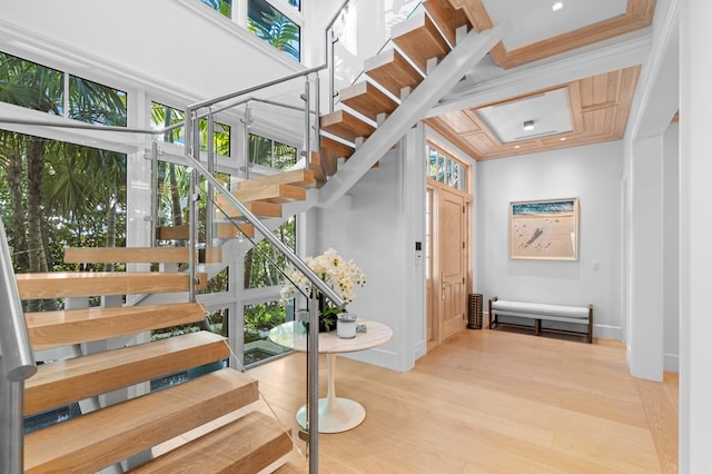 220 Brazilian Ave W Unit, West Unit, Palm Beach, FL 33480 - staircase featuring wood finished floors and baseboards