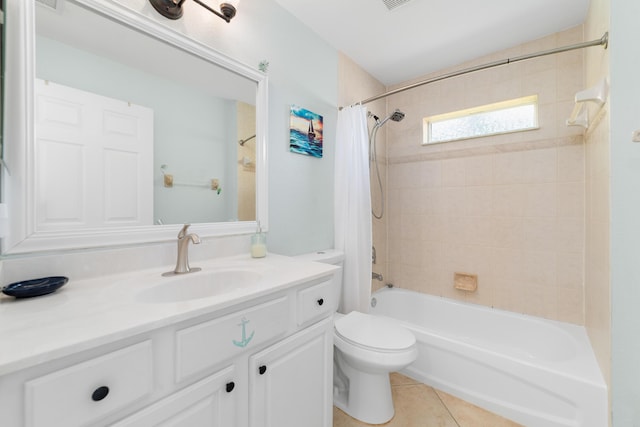 bathroom featuring shower / tub combo with curtain, tile patterned flooring, toilet, and vanity