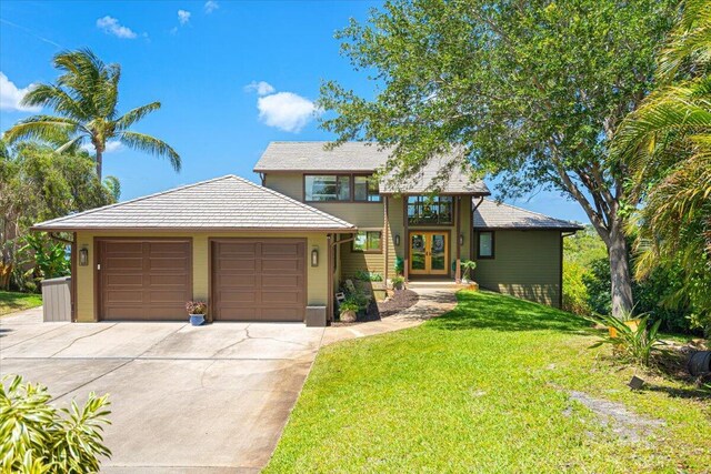 3781 NE Sugarhill Ave, Jensen Beach, FL 34957 - obstructed view of property featuring a front yard