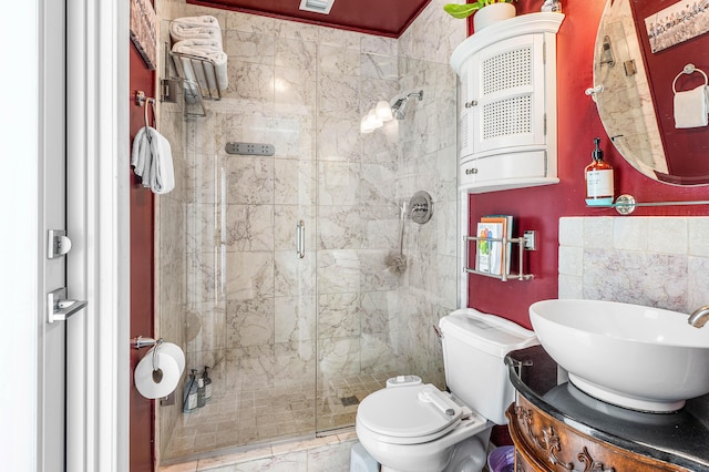1707 NW 38th St, Oakland Park, FL 33309 - full bathroom featuring a shower stall, vanity, and toilet