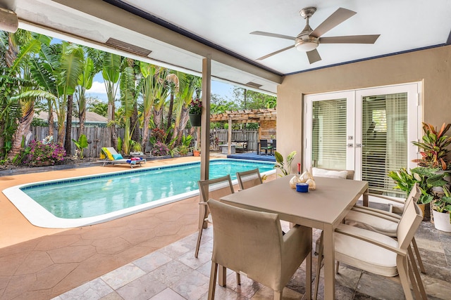 1707 NW 38th St, Oakland Park, FL 33309 - view of swimming pool with a patio, a pergola, ceiling fan, and a fenced backyard