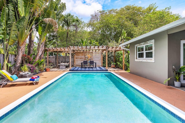 1707 NW 38th St, Oakland Park, FL 33309 - view of pool with a patio area, a pergola, a fenced in pool, and a fenced backyard
