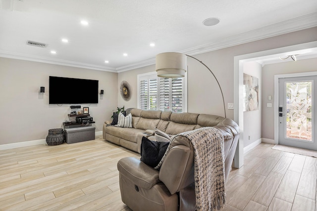 1707 NW 38th St, Oakland Park, FL 33309 - living room with a healthy amount of sunlight, light wood-style flooring, and visible vents