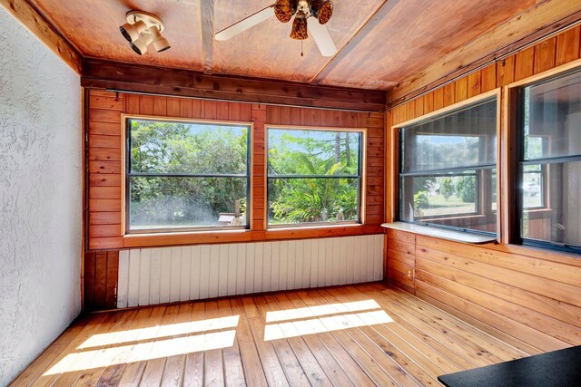 13298 82nd St N, West Palm Beach, FL 33412 - unfurnished sunroom with plenty of natural light and radiator