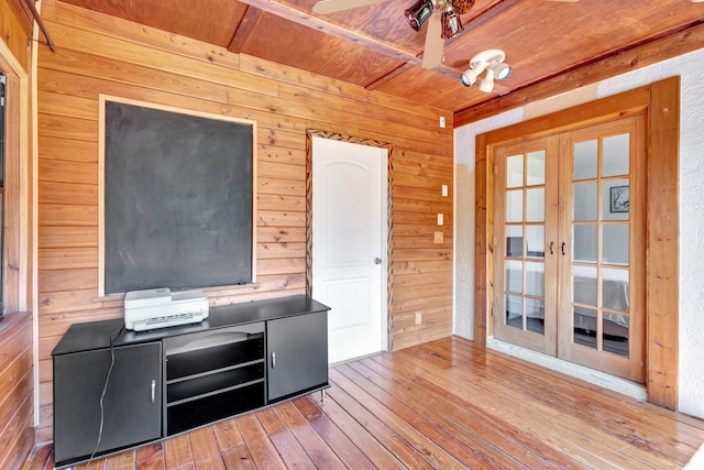 13298 82nd St N, West Palm Beach, FL 33412 - unfurnished office featuring wooden ceiling, wood walls, french doors, and hardwood / wood-style floors