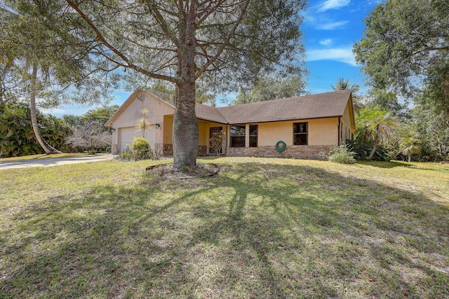 13298 82nd St N, West Palm Beach, FL 33412 - single story home with stucco siding, stone siding, a garage, and concrete driveway