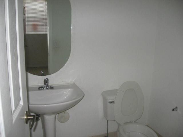half bathroom with toilet
