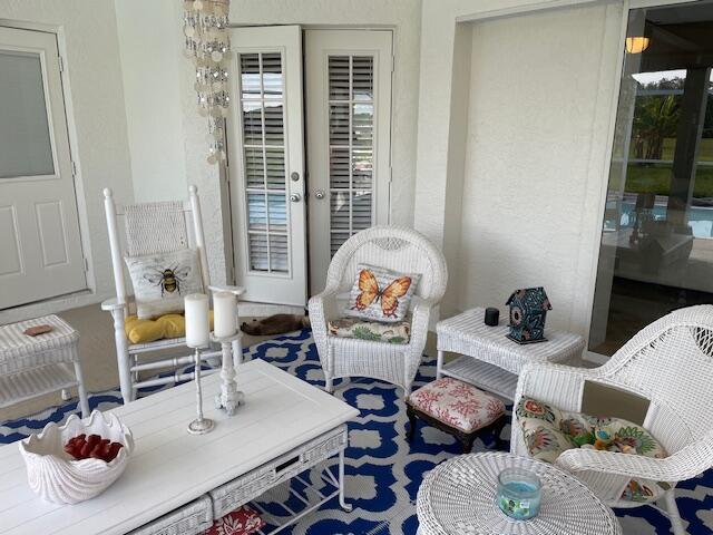 1618 SW Lexington Dr NW, Port Saint Lucie, FL 34953 - view of sunroom