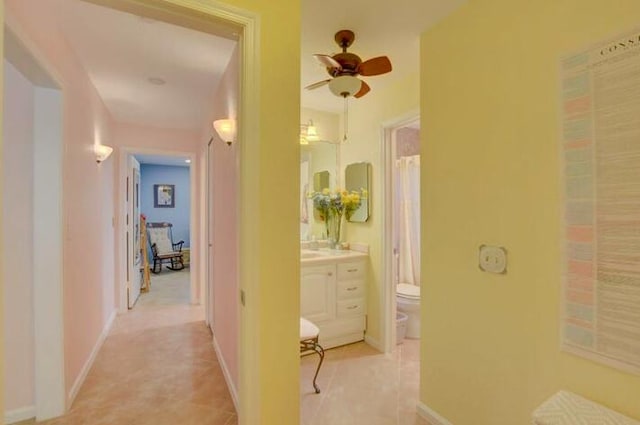 4728 Finchwood Rd Unit B, Boynton Beach, FL 33436 - hall featuring light tile patterned flooring and baseboards
