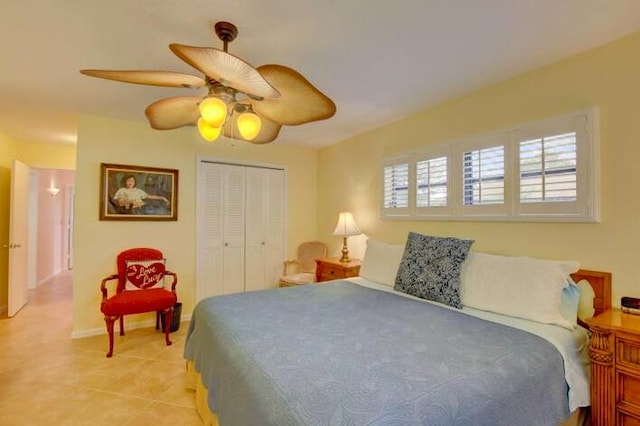 4728 Finchwood Rd Unit B, Boynton Beach, FL 33436 - bedroom with a closet, light tile patterned flooring, a ceiling fan, and baseboards