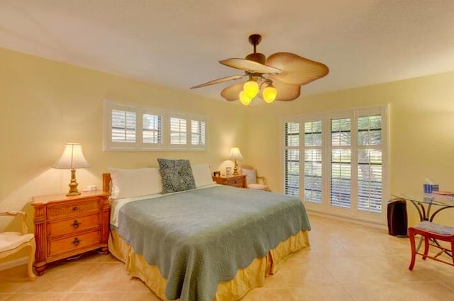 4728 Finchwood Rd Unit B, Boynton Beach, FL 33436 - bedroom with light tile patterned floors and a ceiling fan