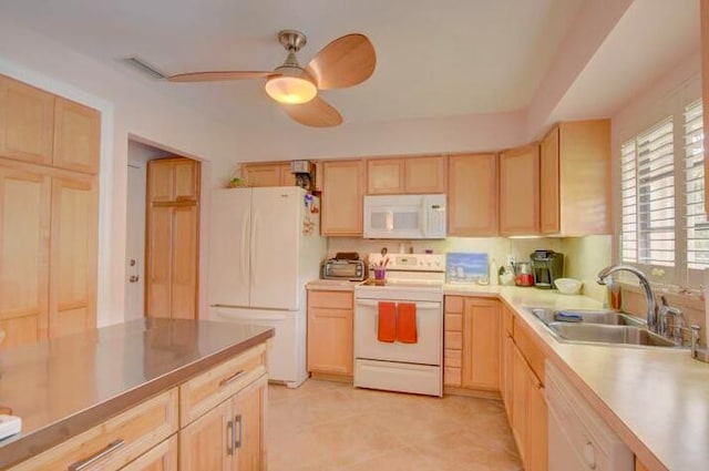 4728 Finchwood Rd Unit B, Boynton Beach, FL 33436 - kitchen with white appliances, light brown cabinets, a sink, and ceiling fan