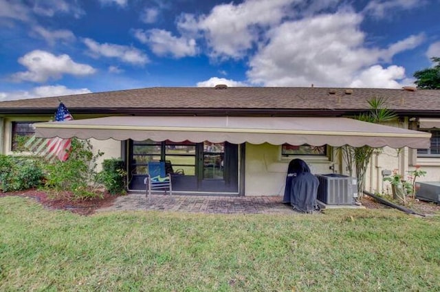 4728 Finchwood Rd Unit B, Boynton Beach, FL 33436 - back of property with central AC unit and a yard
