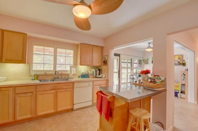 4728 Finchwood Rd Unit B, Boynton Beach, FL 33436 - kitchen with white dishwasher, a ceiling fan, a sink, and light countertops