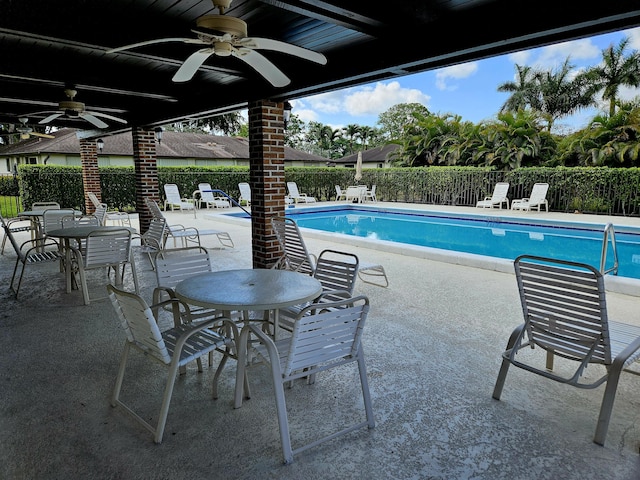 4728 Finchwood Rd Unit B, Boynton Beach, FL 33436 - community pool with a fenced backyard, a ceiling fan, and a patio