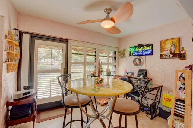 4728 Finchwood Rd Unit B, Boynton Beach, FL 33436 - dining space with plenty of natural light, a ceiling fan, and light tile patterned floors