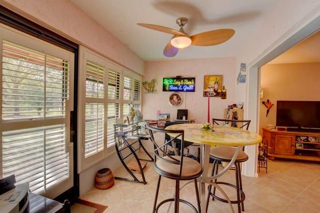 4728 Finchwood Rd Unit B, Boynton Beach, FL 33436 - dining room featuring light tile patterned flooring, ceiling fan, and healthy amount of natural light