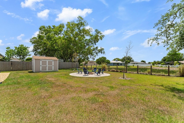 5248 NW Gamma St, Port Saint Lucie, FL 34986 - view of yard with a shed, an outdoor fire pit, an outbuilding, and a patio area