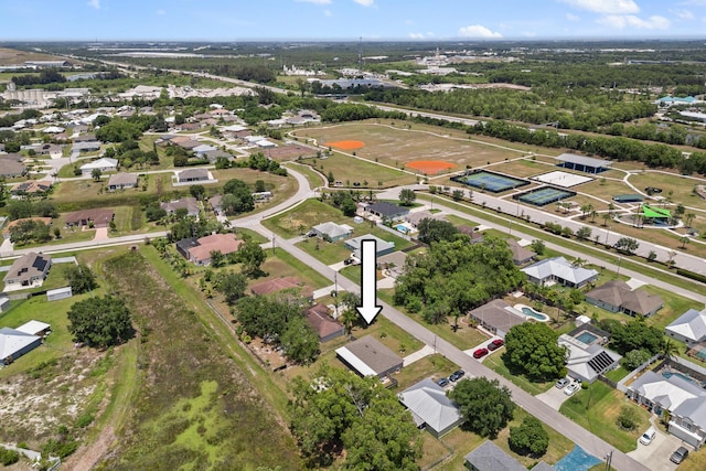 5248 NW Gamma St, Port Saint Lucie, FL 34986 - aerial view of property's location featuring nearby suburban area