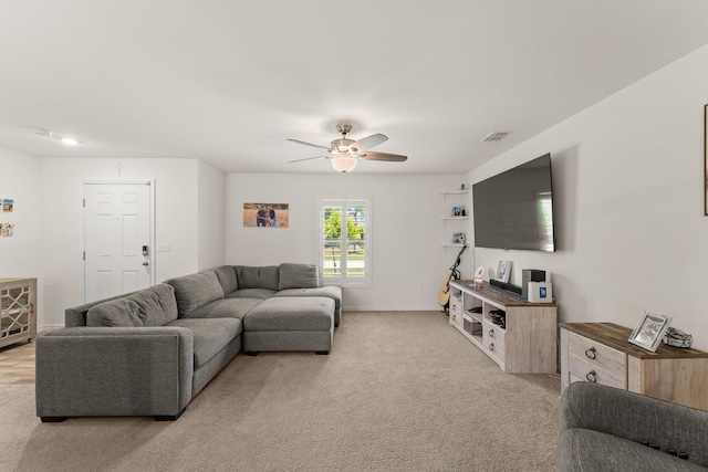 5248 NW Gamma St, Port Saint Lucie, FL 34986 - living area with ceiling fan, light colored carpet, and baseboards