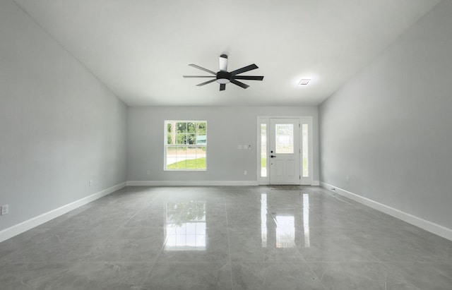 12180 SE 89th Ter, Belleview, FL 34420 - unfurnished room featuring a ceiling fan, baseboards, and vaulted ceiling