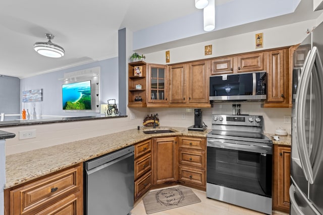 802 W Windward Way Unit 304, Lantana, FL 33462 - kitchen with appliances with stainless steel finishes, brown cabinetry, light stone counters, backsplash, and glass insert cabinets