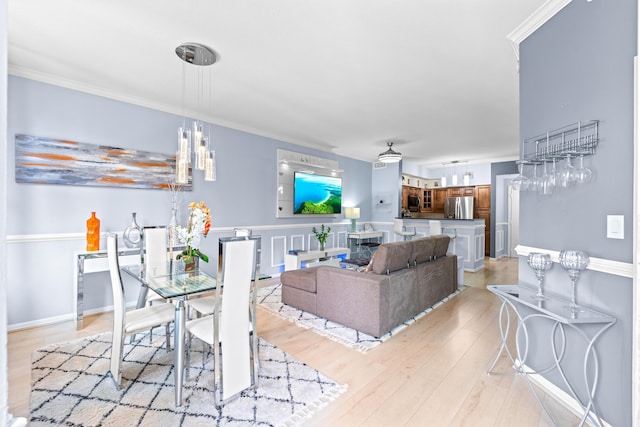 802 W Windward Way Unit 304, Lantana, FL 33462 - dining space featuring light wood finished floors and crown molding