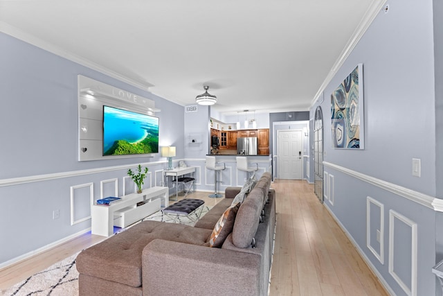 802 W Windward Way Unit 304, Lantana, FL 33462 - living room with ornamental molding, light wood-style flooring, and baseboards