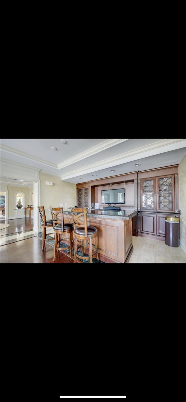 802 W Windward Way Unit 304, Lantana, FL 33462 - kitchen with ornamental molding and light tile patterned floors