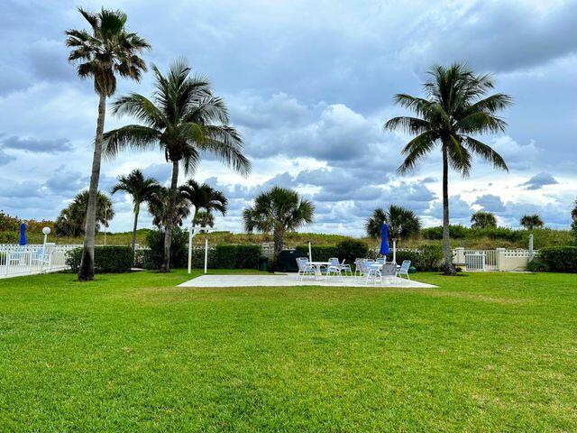 view of yard with a patio and fence