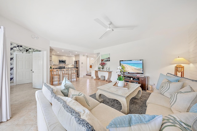 2703 Fairway Dr N, Jupiter, FL 33477 - living room with stairway and a ceiling fan