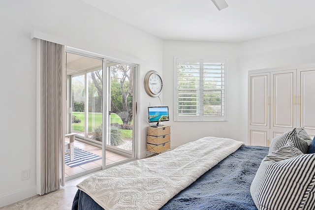 2703 Fairway Dr N, Jupiter, FL 33477 - bedroom with access to outside and baseboards