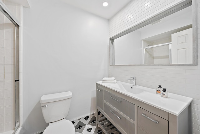 2703 Fairway Dr N, Jupiter, FL 33477 - bathroom featuring vanity, a tile shower, tile patterned floors, and recessed lighting