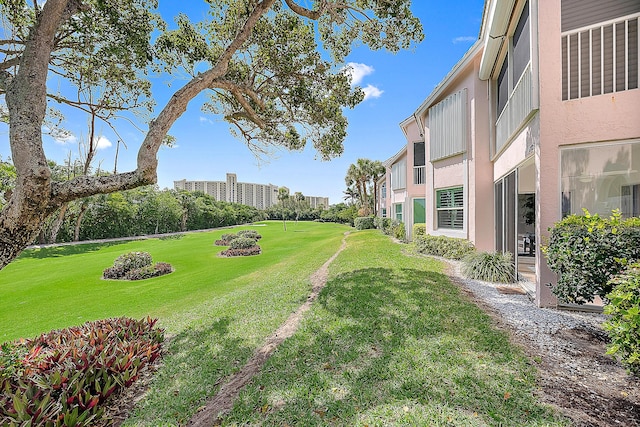 2703 Fairway Dr N, Jupiter, FL 33477 - view of green lawn with golf course view