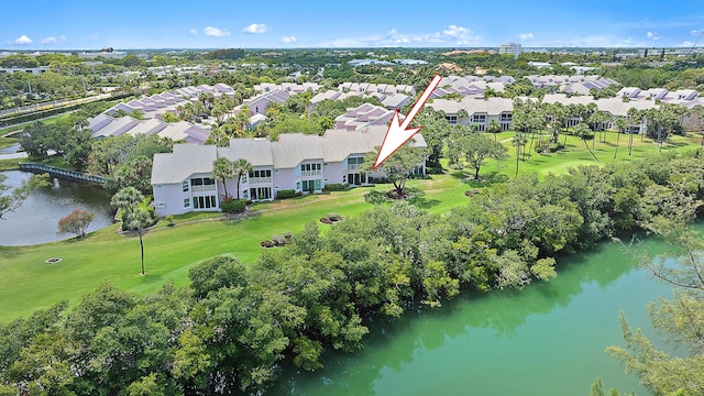 2703 Fairway Dr N, Jupiter, FL 33477 - aerial perspective of suburban area with a nearby body of water and a local golf course