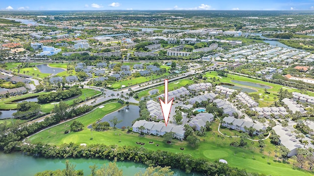 2703 Fairway Dr N, Jupiter, FL 33477 - aerial overview of property's location featuring a nearby body of water and nearby suburban area
