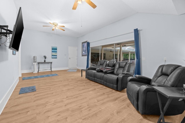 living area with a ceiling fan, light wood-style floors, lofted ceiling, and baseboards