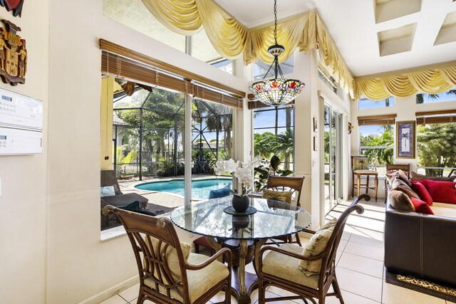 1815 Waldorf Dr, Royal Palm Beach, FL 33411 - sunroom featuring healthy amount of natural light, a chandelier, and outdoor dining area