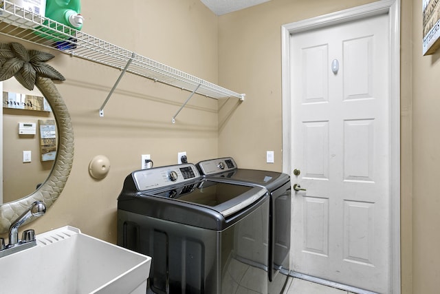 1815 Waldorf Dr, Royal Palm Beach, FL 33411 - laundry area featuring washing machine and dryer and tile patterned floors