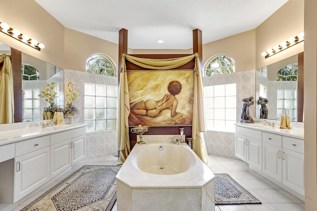 1815 Waldorf Dr, Royal Palm Beach, FL 33411 - bathroom with two vanities, tile patterned flooring, and a bath
