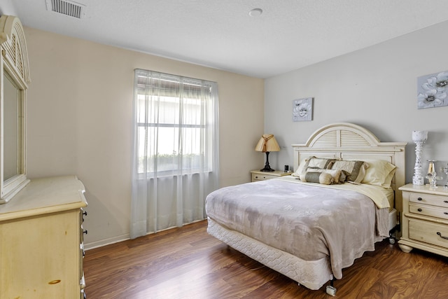 1815 Waldorf Dr, Royal Palm Beach, FL 33411 - bedroom with dark wood finished floors and baseboards