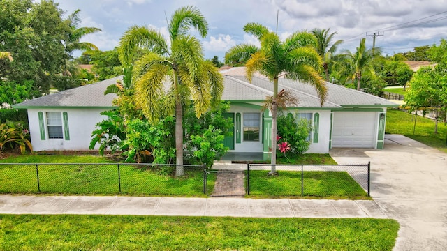 102 SW 13th Ave, Delray Beach, FL 33444 - view of front facade with a garage, stucco siding, and concrete driveway