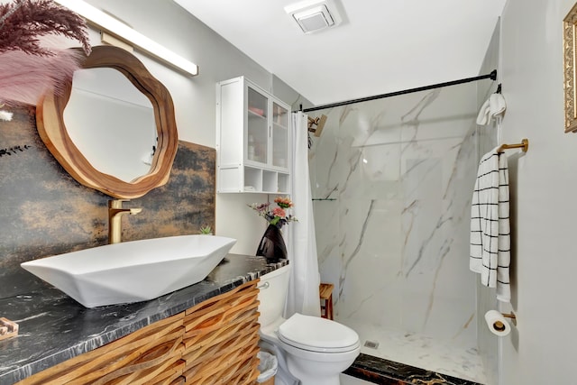 115 W 31st Ct, Riviera Beach, FL 33404 - full bath with vanity, toilet, a marble finish shower, and visible vents