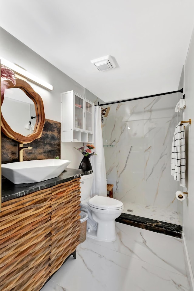 115 W 31st Ct, Riviera Beach, FL 33404 - bathroom featuring toilet, marble finish floor, vanity, visible vents, and a stall shower