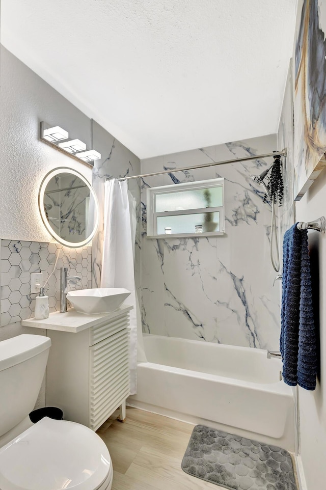 115 W 31st Ct, Riviera Beach, FL 33404 - full bath with toilet, tile walls, shower / tub combo with curtain, and vanity